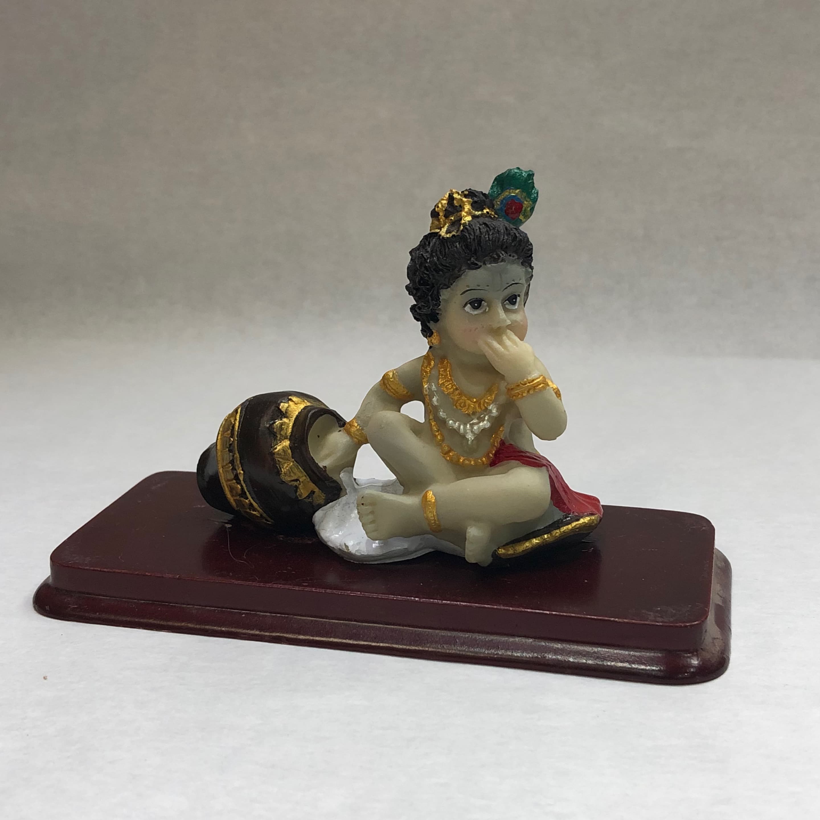 Baby Krishna Eating Butter - Approx. 3 Inch